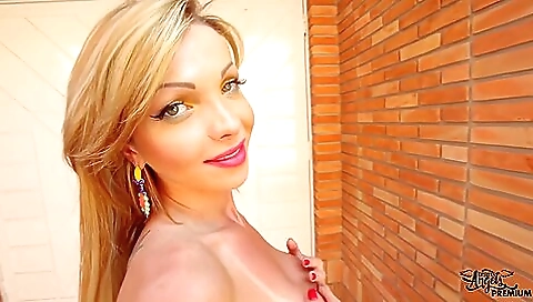 Blonde shemale in white bikini enjoys a deepthroat sex