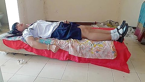 Hot schoolgirl in school uniform posing for the camera