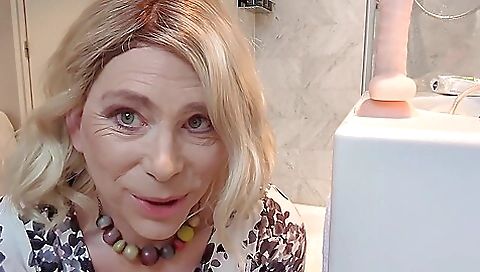 British milf is getting her hole drilled with a dildo